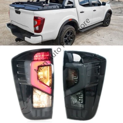 Conjunto de luces traseras de freno traseras LED de 2 piezas para Nissan NP300 Navara 2015-2023 humo Foto 1 de 4