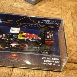 1/43 Minichamps 410130101 Red Bull Racing Sebastian Vettel 2012 Show at limited - Picture 1 of 9