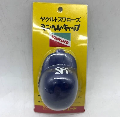 Mini casco de béisbol vintage Suntory Orangeade promo tapa botella Yakult Swallows Foto 1 de 3