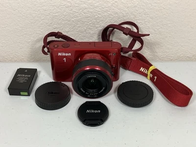 Cámara digital Nikon 1 J1 10,1 MP - roja (Kit con lente VR 10-30 mm) Foto 1 de 4