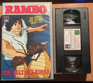 RAMBO - DIE SERIE (1986) - VHS Kassette "Der Kult der Kobra" - deutsche Sprache - Bild 1 von 4