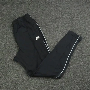 Pantaloni Nike Track Uomo Medium Nero Bianco Sportivi Joggers Conici con Polsini Logo - Foto 1 di 8