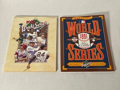 Lot  2 MLB Official World Series 1991 Souvenir Scorebook & 1987 Official Program - Image 1 of 2