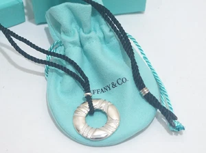 Tiffany & Co.  Silver Atlas Roman Numeral Round Pendant Silk Rope Cord Necklace - Picture 1 of 6