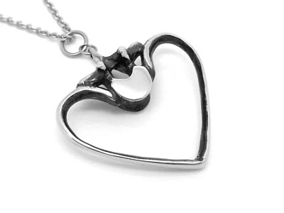 Costillas humanas y vértebras corazón colgante collar quiropráctico joyería encanto Foto 1 de 4