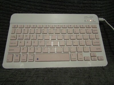 Ultra-Slim Wireless Bluetooth Keyboard: Compatible with iPhone iPads, and Tablet - Image 1 of 4