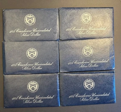 Fifteen  1972 and 1974 Eisenhower Dollar Blue US envelopes w/COA & blue chip - Image 1 of 4