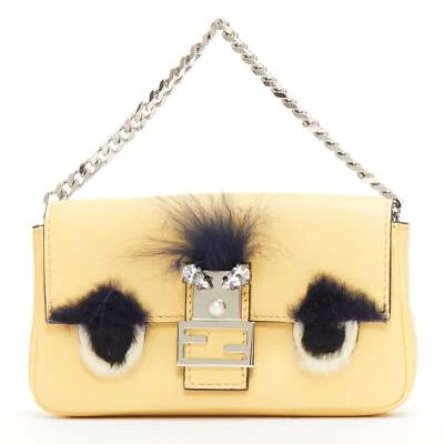 Bolso FENDI Micro Baguette amarillo mantequilla negro ojo piel cuero asa superior Foto 1 de 4
