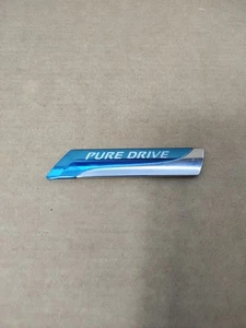 NISSAN MICRA K12 NOTE E11 REAR PURE DRIVE BADGE BG00A - Picture 1 of 4