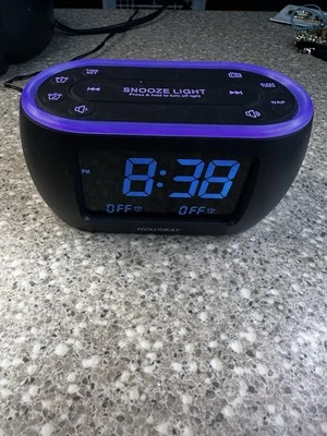 HOUSBAY RS1 Brillo Pequeño Reloj Despertador Radio para Dormitorios con Luz Nocturna de 7 Colores Foto 1 de 4