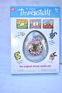 TAMAGOTCHI CLASSIC GEN 2 (2018) PINK/SCHWARZ TIGERPUNKTE MIT NEONKNÖPFEN - BANDAI - Bild 1 von 6