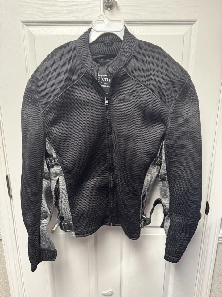 Chaqueta de motociclista Xelement unisex negra blindada forrada acolchada textil talla XL Foto 1 de 4