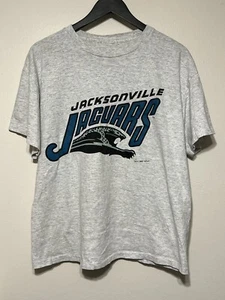 Vintage 1993 Jacksonville Jaguars T Shirt Banned Logo Size L Heather Grey NFL - Picture 1 of 11