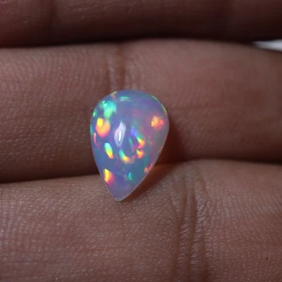 2 Cts 13.1x9 MM Natural AAA Green Red Yellow Fire Ethiopian Opal Pear Cabochon - Image 1 of 4