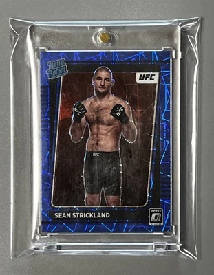 SEAN STRICKLAND ⚡️UFC CHAMPION!! “RARE” ✨ROOKIE✨ (PARALLEL) BLUE REFRACTOR CARD! - Image 1 of 2
