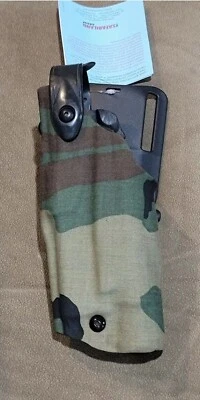 Funda táctica Safariland 6360 Glock Woodland mano izquierda pierna caída FUNDA Y GOTA Foto 1 de 4