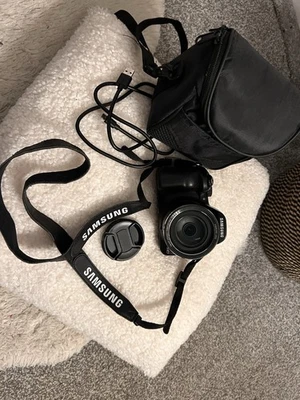 Цифровая камера Samsung серии WB WB1100F 16,4 Мп - черная - Изображение 1 из 4