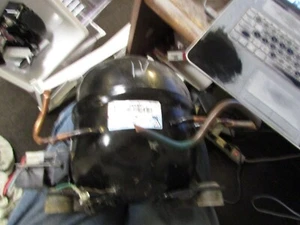 241650210 FRIGIDAIRE REFRIGERATOR COMPRESSOR COMPLETE PANASONIC DGK66C10RLU - Picture 1 of 8