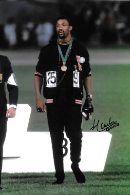 john carlos successful after winning bronze BLACK POWER 1968 signed 12x8 photo  - Image 1 of 4