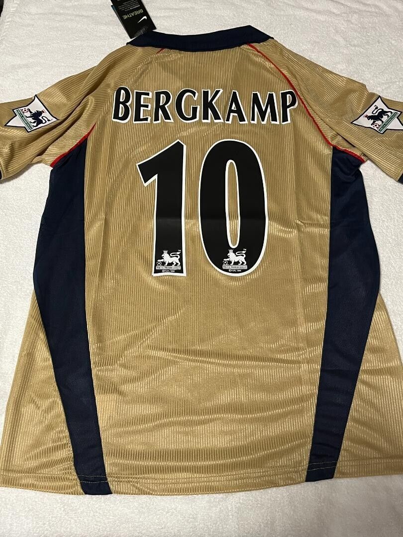 Nike Arsenal Gold International Club Soccer Fan Apparel and Nike Arsenal Gold International Club Soccer Fan Apparel and