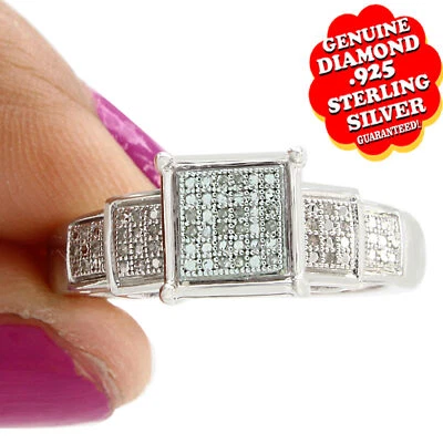 Anillo de compromiso con halo de diamantes naturales de 1/10 quilate enchapado en oro blanco de 14 quilates en plata Foto 1 de 4