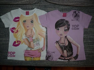 2 x T-Shirt für Mädchen in Größe 116 / 122 Top Model lila / flieder + weiß - Bild 1 von 1