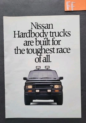 Camiones Nissan de carrocería dura promoción cargador de 8 páginas insertar anuncio impreso 1988 Foto 1 de 4