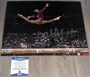 GABBY GABRIELLE DOUGLAS SIGNED USA GYMNASTICS 11x14 PHOTO wEXACT PROOF & BAS COA - Picture 1 of 2