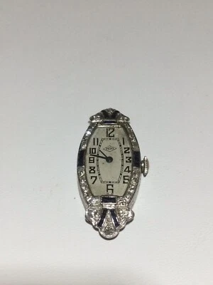 Caja de reloj vintage de platino, zafiro y diamantes de Perry Foto 1 de 4