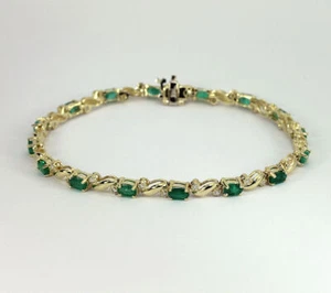 Lab Created Emerald & Diamond 5.00CT Oval 14k Gold Plated 7.5" Tennis Bracelet - Picture 1 of 6
