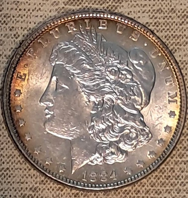 1884-P Morgan Silver Dollar 90%   Stunning Rainbow Toning!!  BU - Image 1 of 4