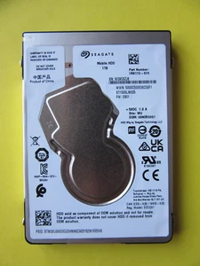 Seagate ST1000LM035 1RK172-570 disco rigido HDD da 7 mm 1 TB 2,5" novembre 2021 WU EB01 WQ9 - Foto 1 di 8
