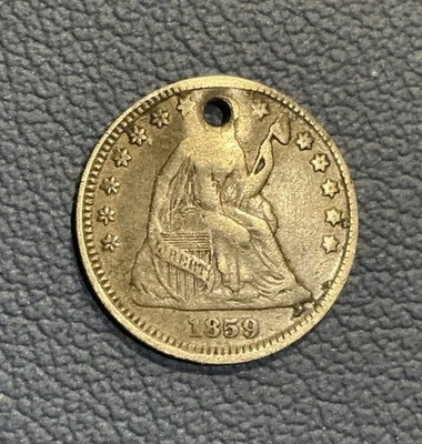 Media moneda de diez centavos libertad sentada 1859 - plata Foto 1 de 3
