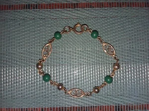 Vintage Armband 70er Jahre goldfarben mit grünen Perlen - Bild 1 von 2