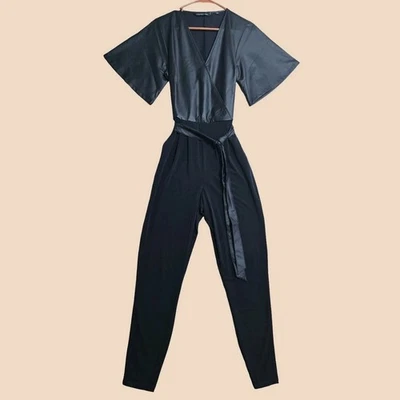 Mono Colleen Lopez para mujer XS imitación cuero envolvente con cinturón negro NUEVO Foto 1 de 4
