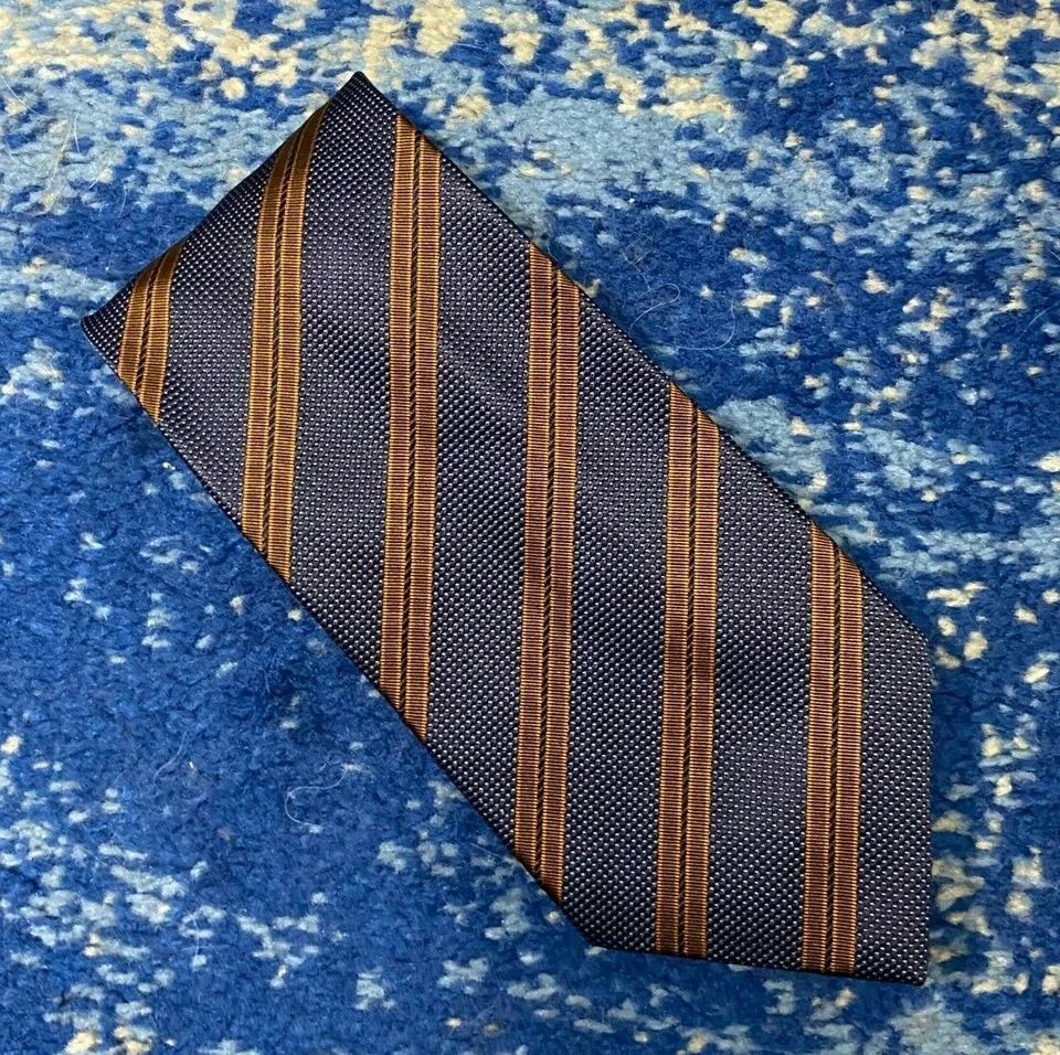 Corbata de seda Corneliani marrón óxido azul marino rayas sesgadas hecha a mano en Italia Foto 1 de 4