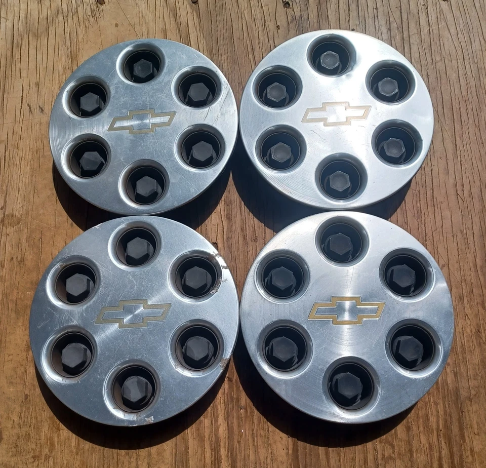 Комплект из 4 центральных колпаков Chevrolet Tahoe Astro Avalanche 2000-2003 p/n 15004143 S6 - Изображение 1 из 3