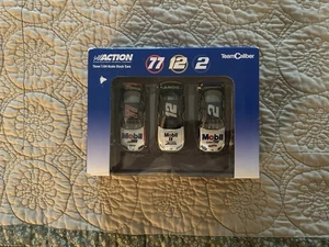 Action Team Caliber Mobil Stock Cars NASCAR Maßstab 1:64, Nummer 77-12-2 BRANDNEU - Bild 1 von 2
