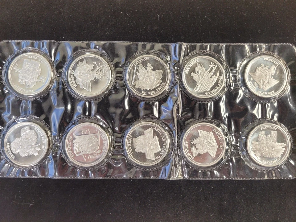 Johnson Matthey Bill of Rights JUEGO COMPLETO 1 OZ rondas x10 999 plata - raro sellado Foto 1 de 4