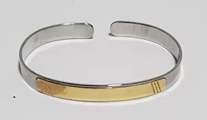 Pulseras abiertas en acero inoxidable con oro de 18 ktes. - Imagen 1 de 10