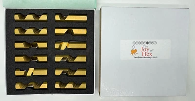 Rompecabezas "Grupo hexagonal" dos monos de latón - sin manual Foto 1 de 4