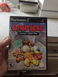 Garfield - Lasagna World Tour (Sony PlayStation 2) PS2 CIB Etiqueta Negra PROBADO - Imagen 1 de 3