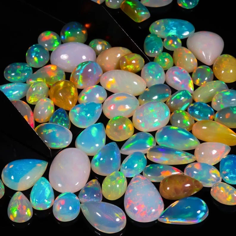 Untreated Natural Welo Ethiopian Fire Opal Gemstone Cabochon Mix Lot - Image 1 of 4
