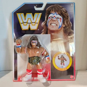 NEU/MOC The Ultimate Warrior mit Champ Gürtel Mattel Hasbro WWF WWE Retros Figur - Bild 1 von 2