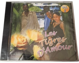 LES TIGRES D'AMOUR BY VARIOUS ARTIST ( HAITIAN CD) ( Crack In Back Of Case ) - Foto 1 di 2