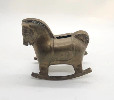 Hucha mecedora de bronce vintage Foto 1 de 4