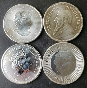 Lot of Four 1oz Silver World Coins - Picture 1 of 3