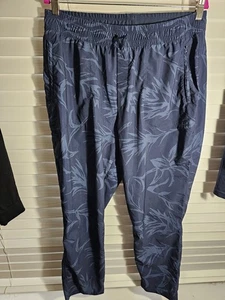 Pantaloni nuovi senza etichette The North Face Upf40+ Never Stop Wearing tasca zip stampa tropicale XL - Foto 1 di 9