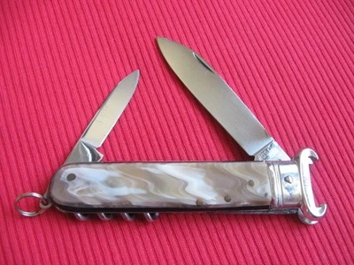 VINTAGE ROSA V. MANIAGO INOX STAMPED ITALIAN MANUAL SHELL PULLER KNIFE - Image 1 of 4