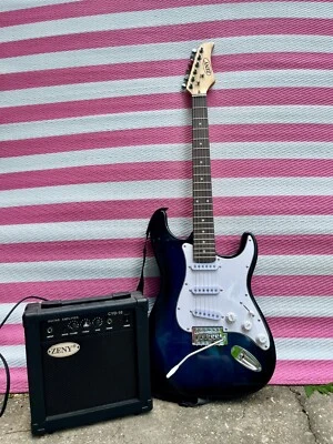 Guitarra Eléctrica Zeny Azul Profundo con Estuche Amplificador Cuerdas Extra  Foto 1 de 2